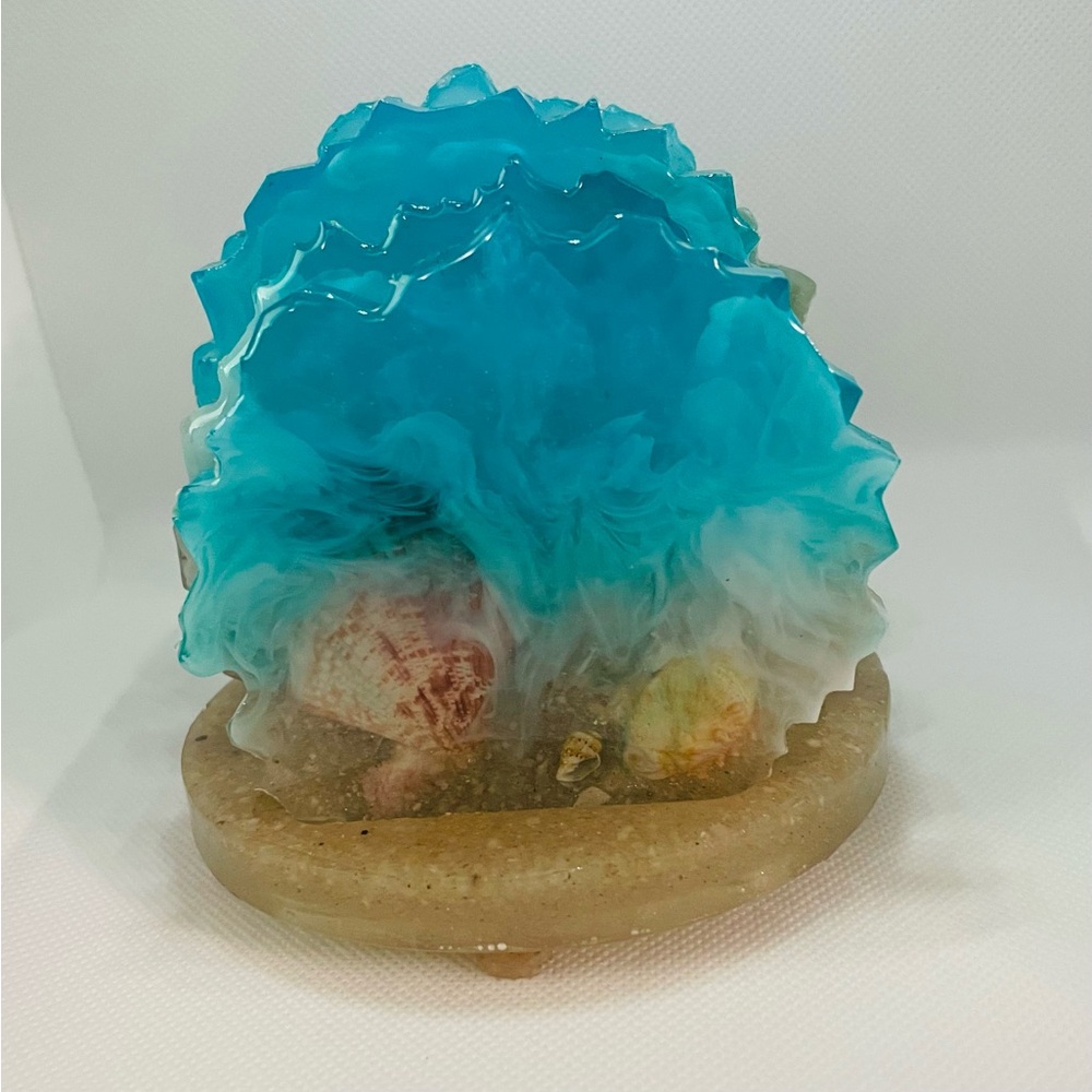 I am selling hand crafted epoxy resin beach scape coasters.